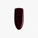 La tonalità della vernice ibrida è il nero spezzato con il bordeaux combinato con un mare di glitter sottili in rosso scuro.