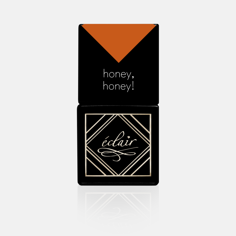 butelka pomarańczowego lakieru hybrydowego Eclair Honey, Honey 7ml