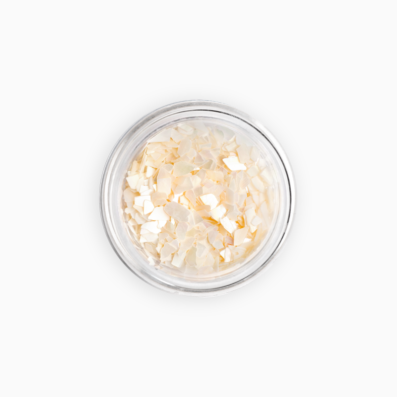 Delikatne, kremowe fragmenty kruszonych muszli VANILLA SHELL, dodające paznokciom elegancji i subtelnego blasku. Delikatne, kremowe fragmenty kruszonych muszli VANILLA SHELL, dodające paznokciom elegancji i subtelnego blasku. - zdjęcie 1
